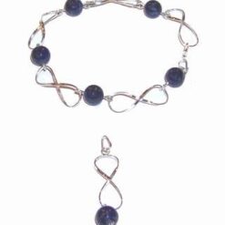 Set din argint in forma de cifra 8 cu lapis lazuli Set din argint in forma de cifra 8 cu lapis lazuli